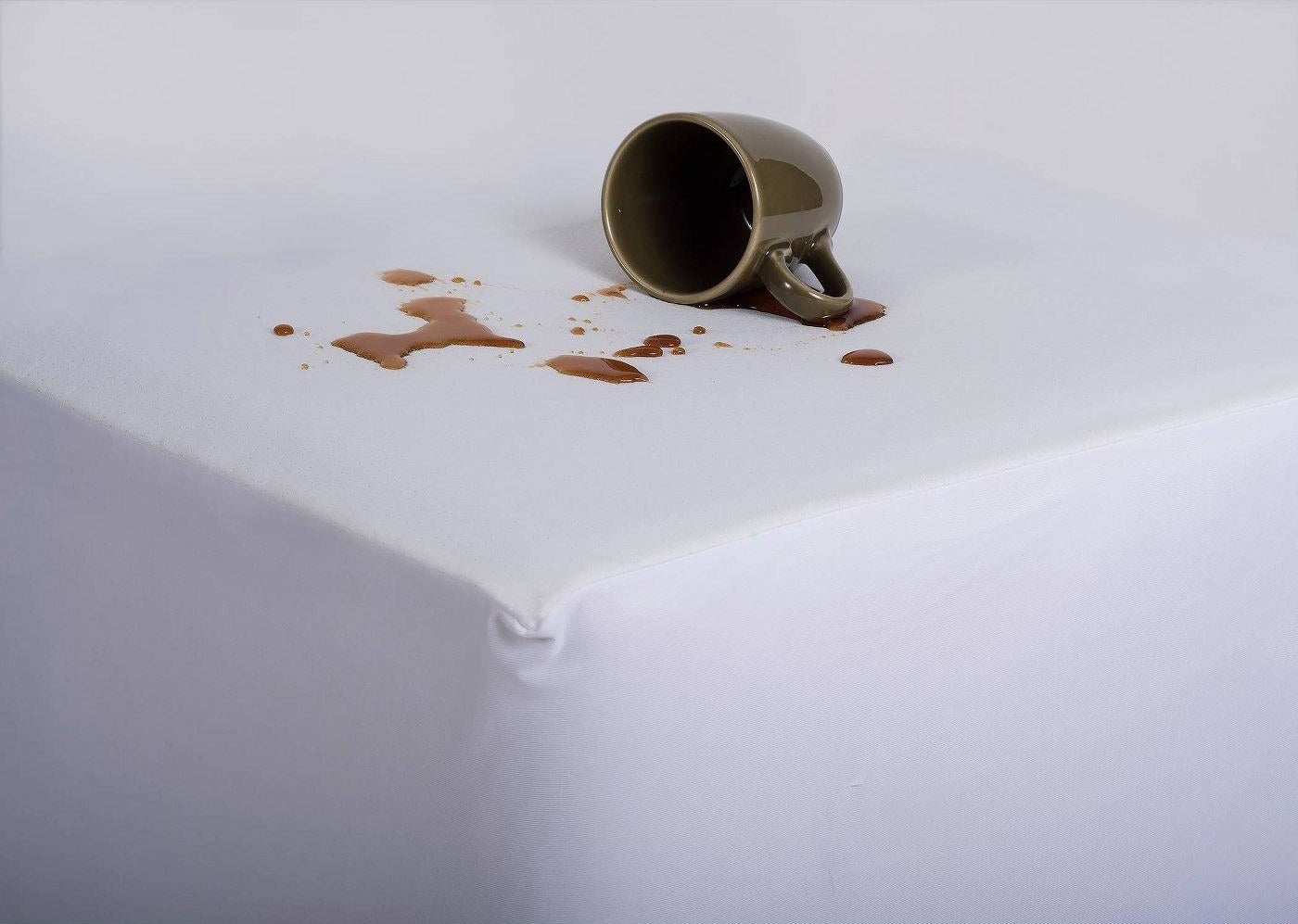 Coffee spill on matress cover