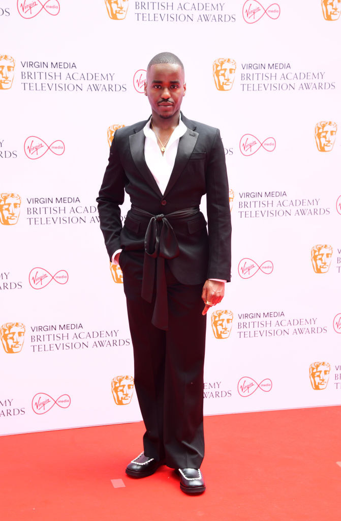 Ncuti Gatwa arrives for the Virgin Media BAFTA TV awards in an open-chested suit