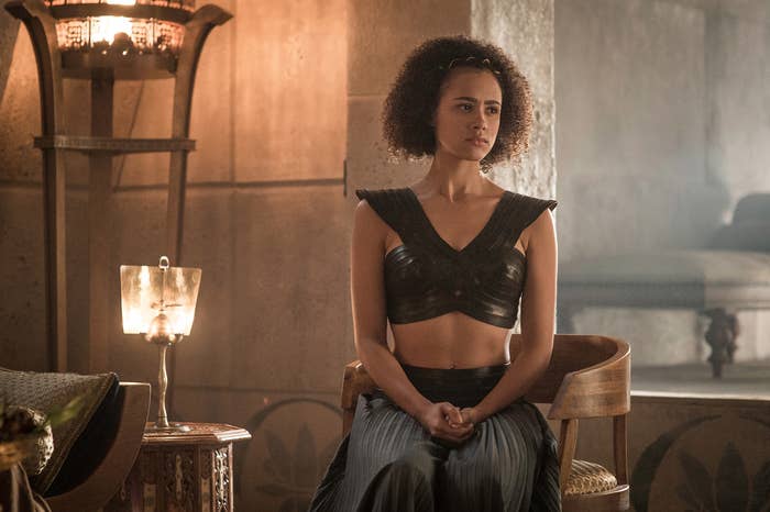 Nathalie Emmanuel sits on a chair in Game of Thrones