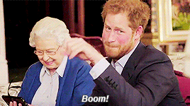 Prince Harry does a mic drop gesture and says, &quot;Boom&quot;