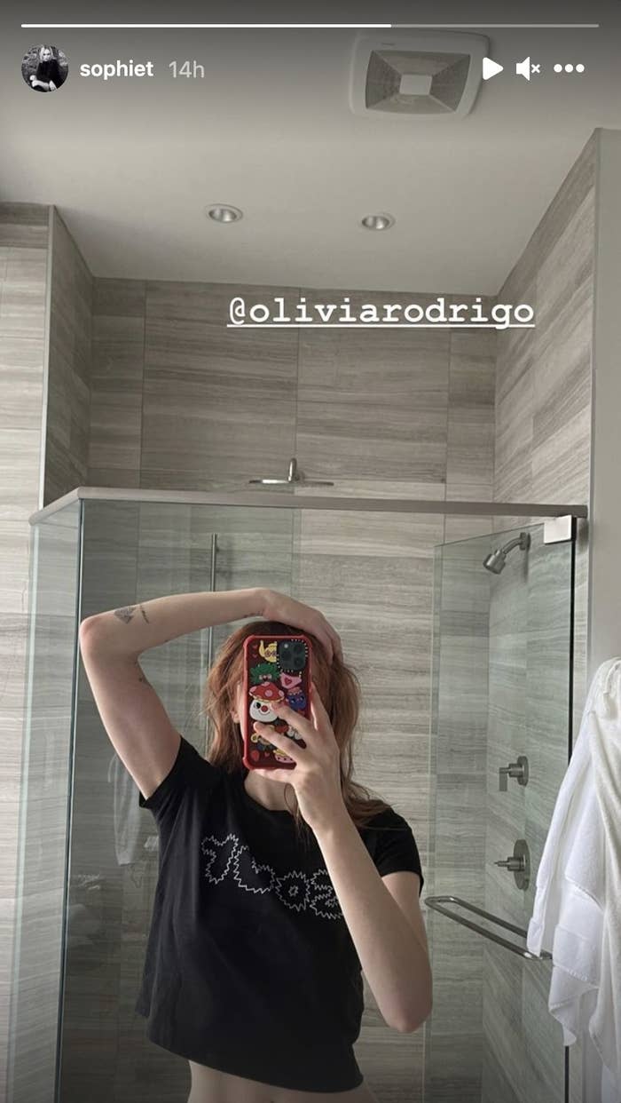 Sophie Turner showing her new hair red off