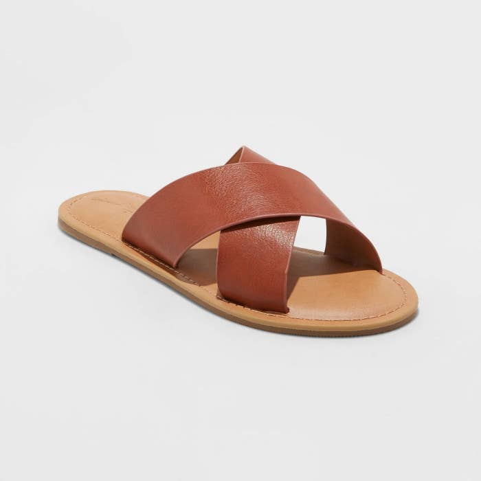 Slip on sandals with camel colored leather straps and tan sole