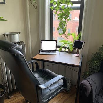 reviewer photo of desk with laptop and tablet on it