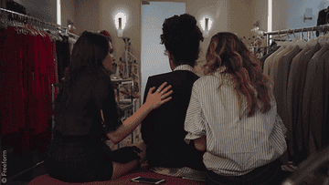 Gif of Jane and Sutton comforting Kat in the fashion closet