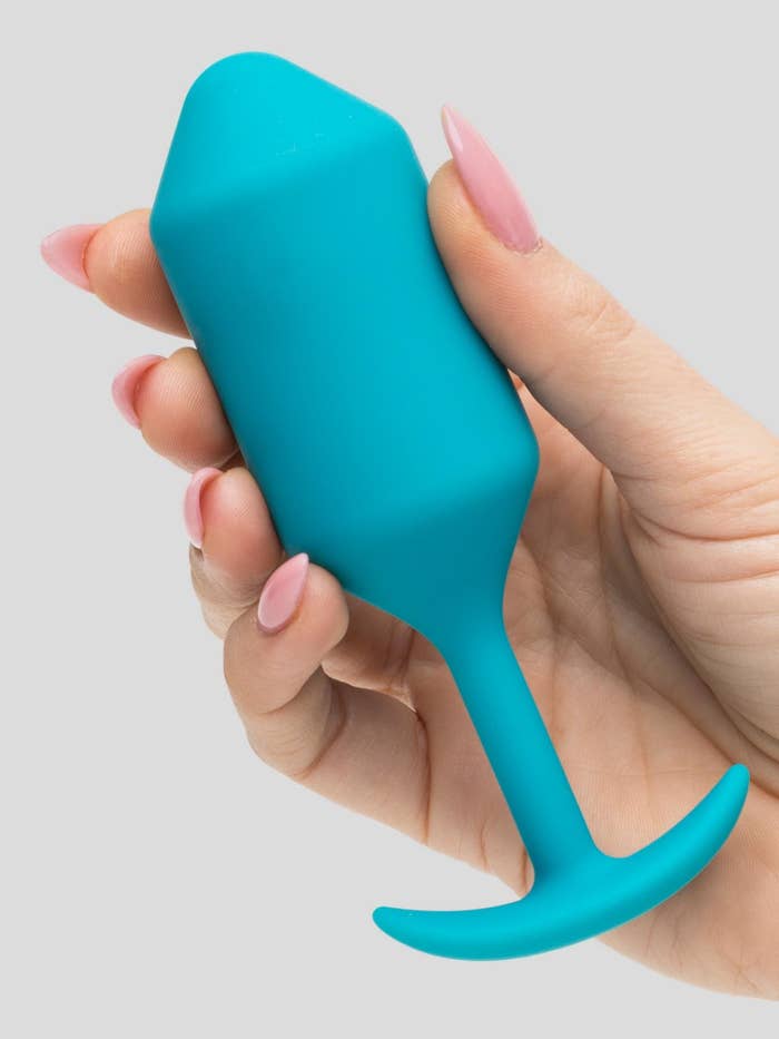 Teal silicone anal plug with T-shaped base