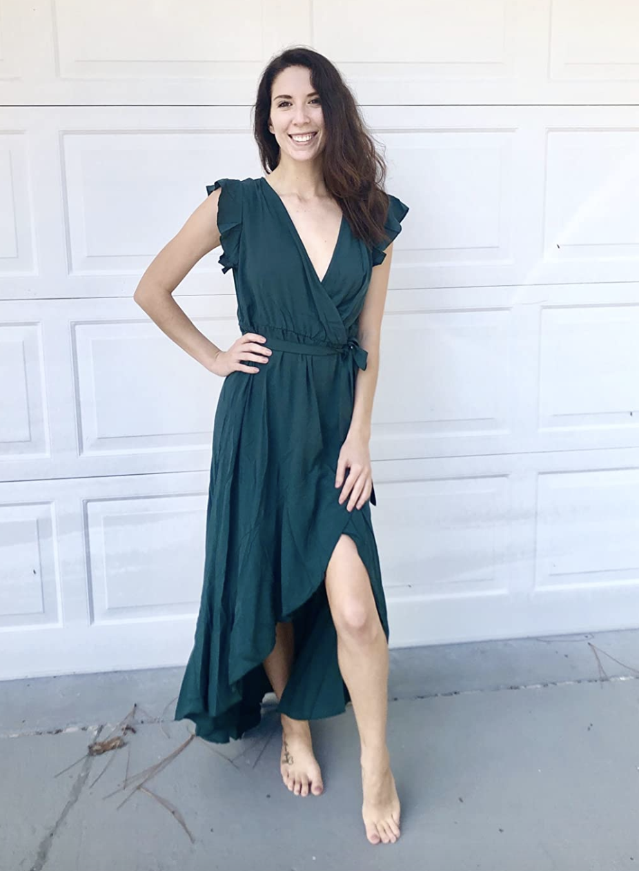reviewer wearing green dress