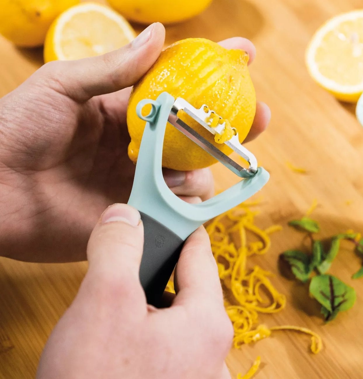 The Y-peeler zesting a lemon