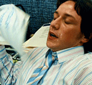 A gif of a sweating James McAvoy in &quot;Wanted&quot; fanning himself with papers 