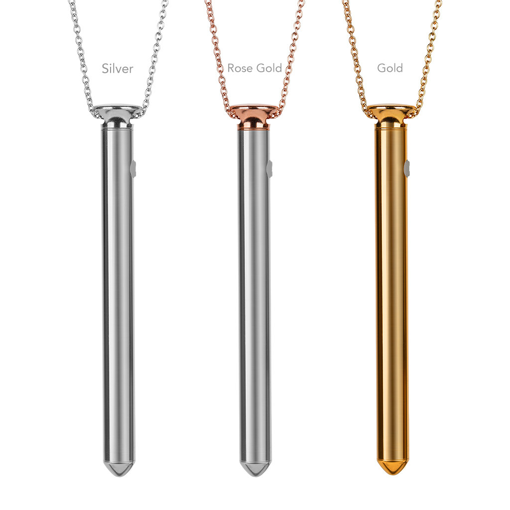 Silver, rose gold, and gold vibrators hanging from necklaces