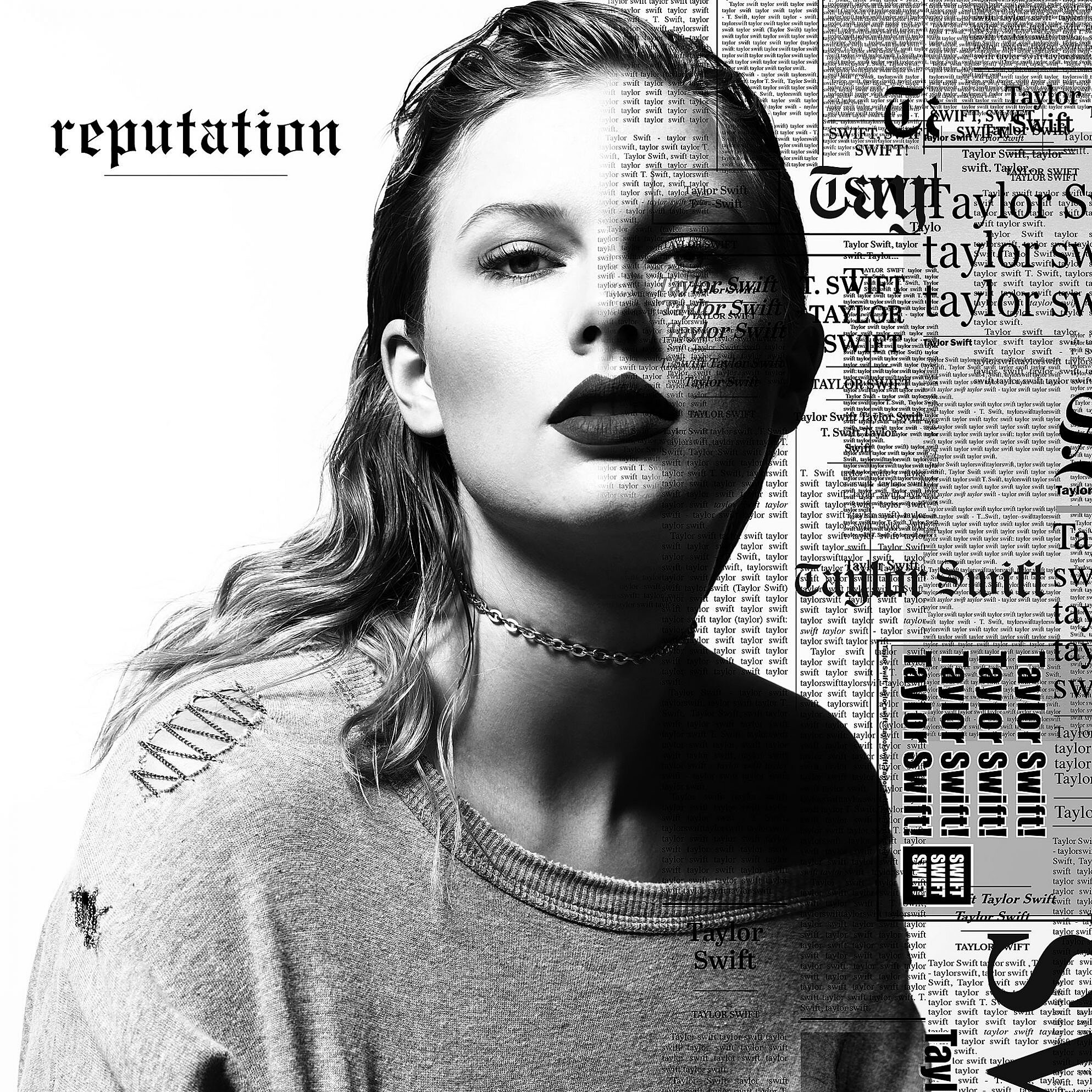 Reputation album cover, taylor wears a distressed sweater and her hair is wet
