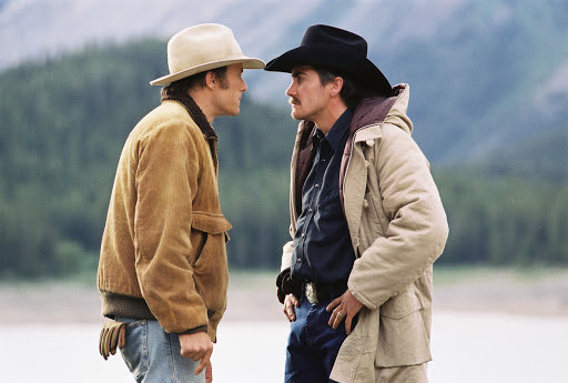 two cowboys arguing, sexual tension bubbling between them