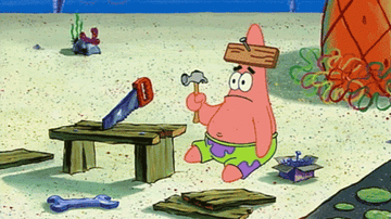 Patrick from SpongeBob sitting looking confused while building a table, holding a hammer with a board nailed to his forehead
