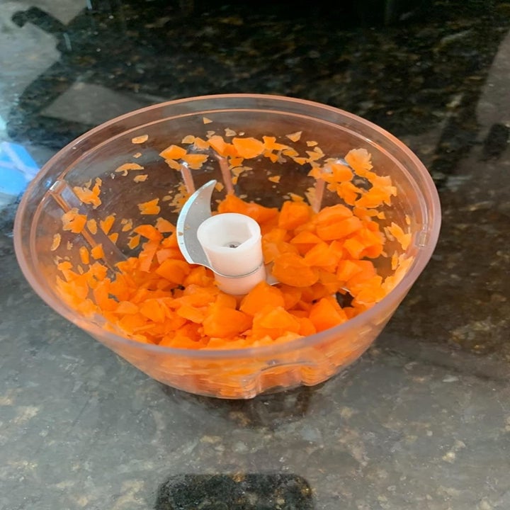 Carrots in chopper after being chopped