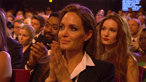 Angelina Jolie clapping at the BAFTA awards