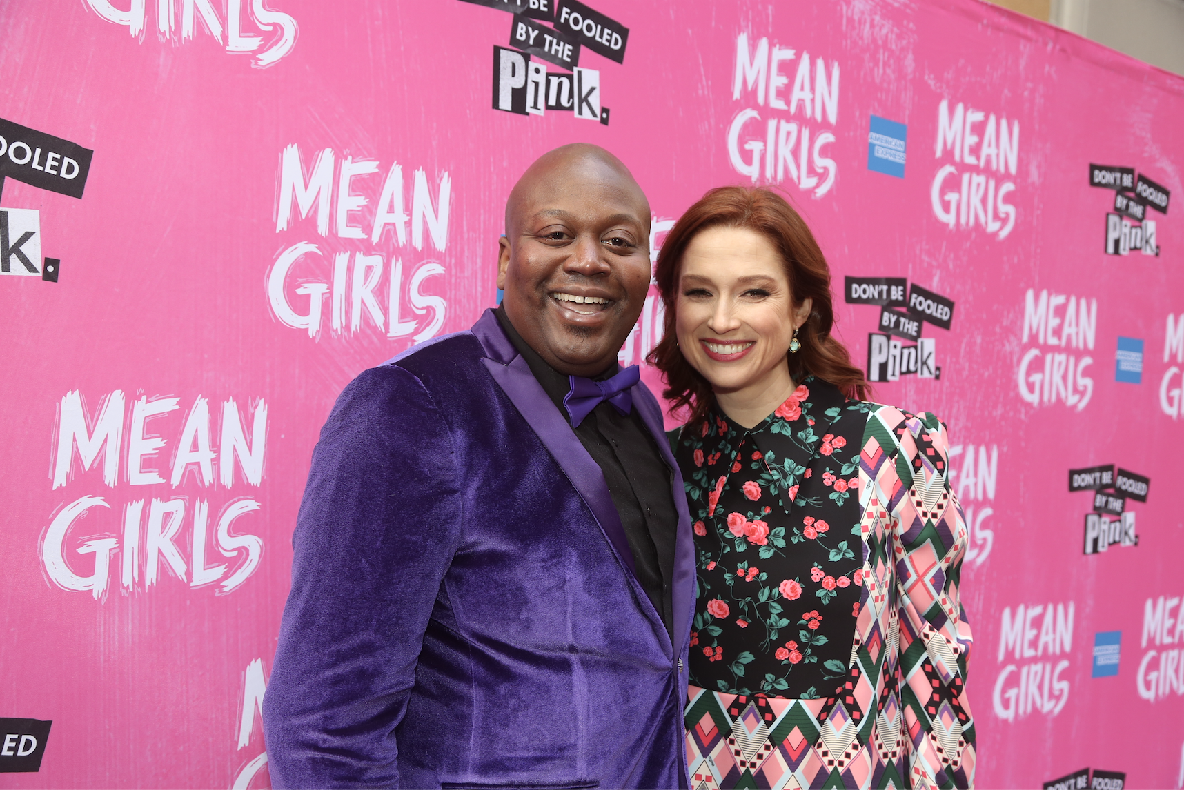 Tituss Burgess and Ellie Kemper pose at the arrivals for the opening night of the new musical based on the cult film "Mean Girls" on Broadway at The August Wilson Theatre on April 8, 2018 in New York City