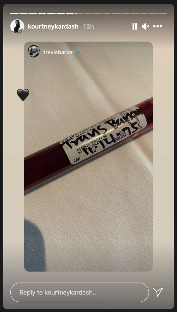 A screenshot of Travis Barker&#x27;s Instagram Story posted to Kourtney Kardashian&#x27;s Instagram story, which contains a picture of a vial of his blood and a black heart emoji