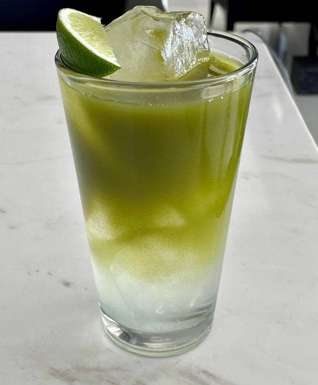 A matcha and limeade mocktail.