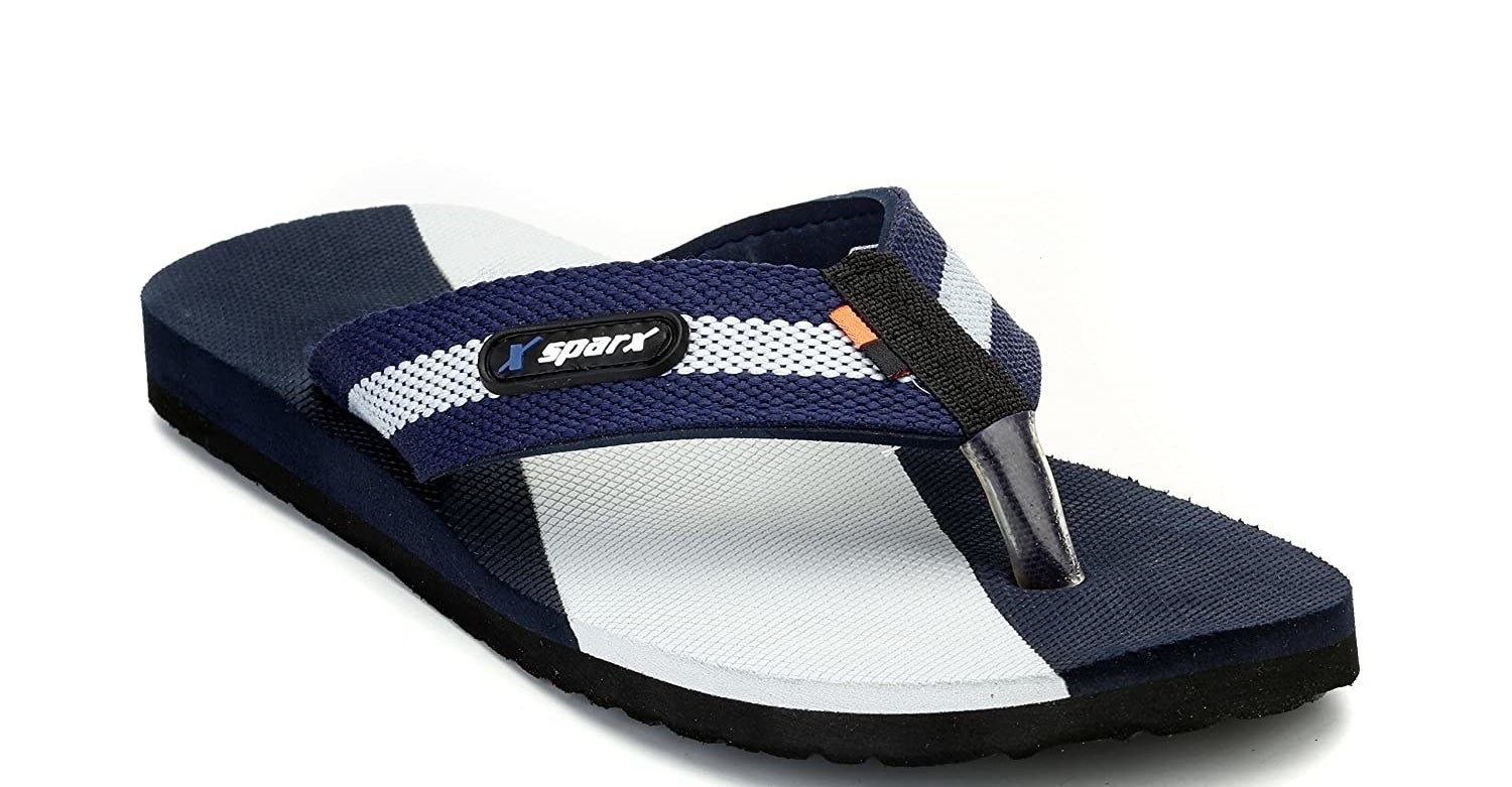 A singular Sparx flip-flop in blue, black, and white