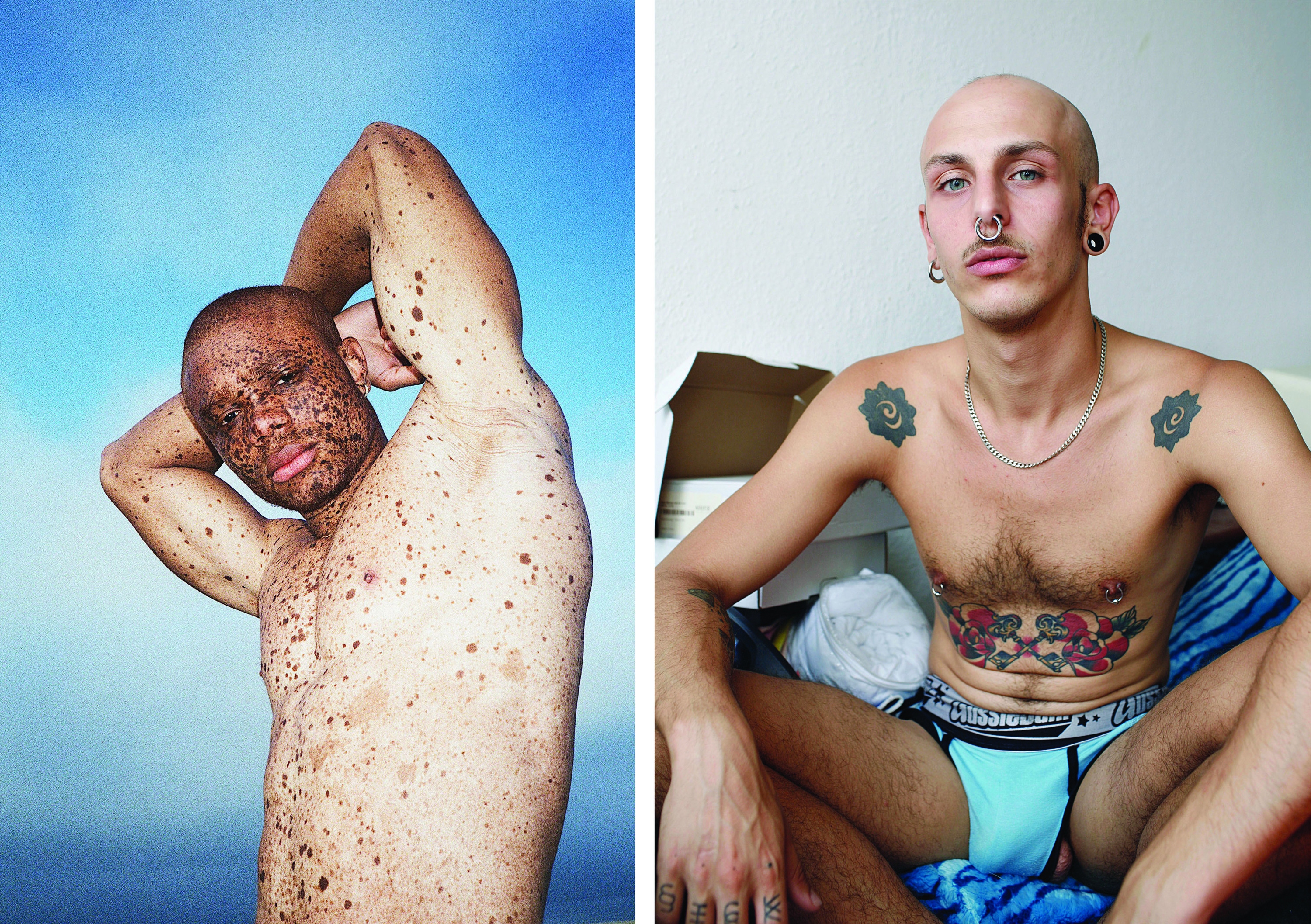 Left, a man with many freckles in front of a blue background with his arms over his head; right, a man with many tattoos in his underwear and a necklace on a blue blanket