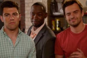 Schmidt frowns deeply, Winston smiles from his place behind Schmidt and Nick, and Nick is mid wink while smiling.