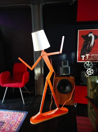 Colorful lamp shaped like a spindly body 