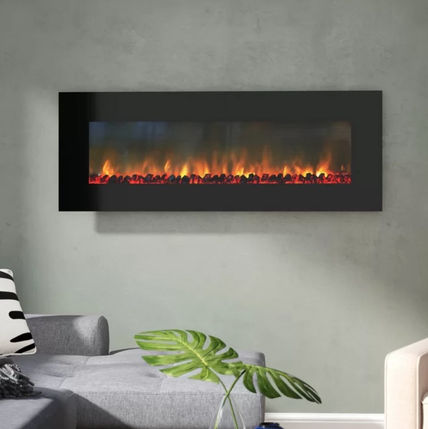 a rectangular fire place in a wall