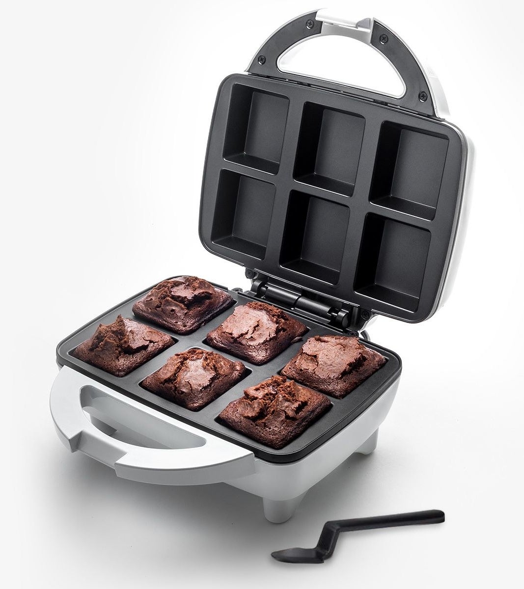 a brownie maker with six baking reservoirs 
