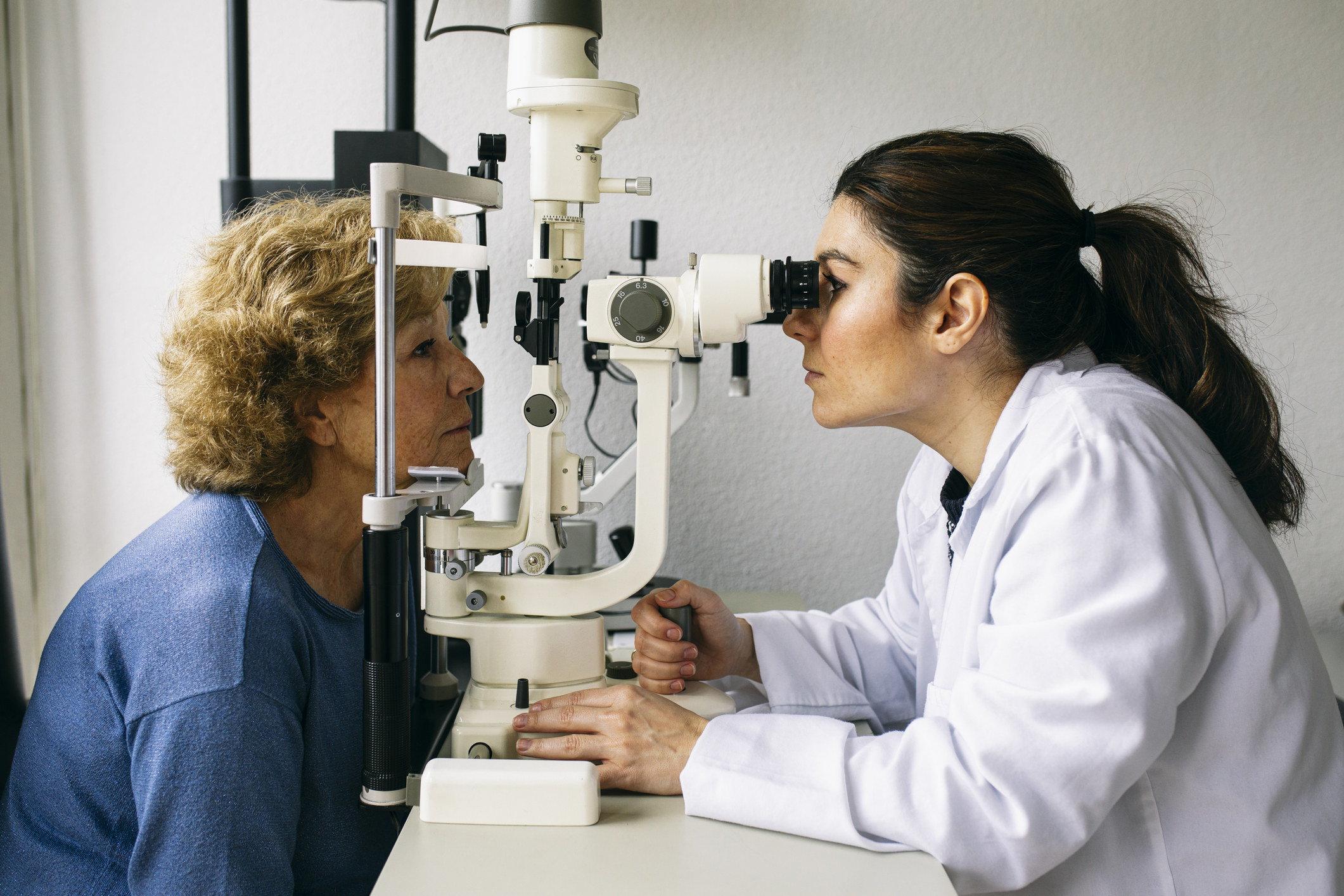 An eye doctor doing an exam