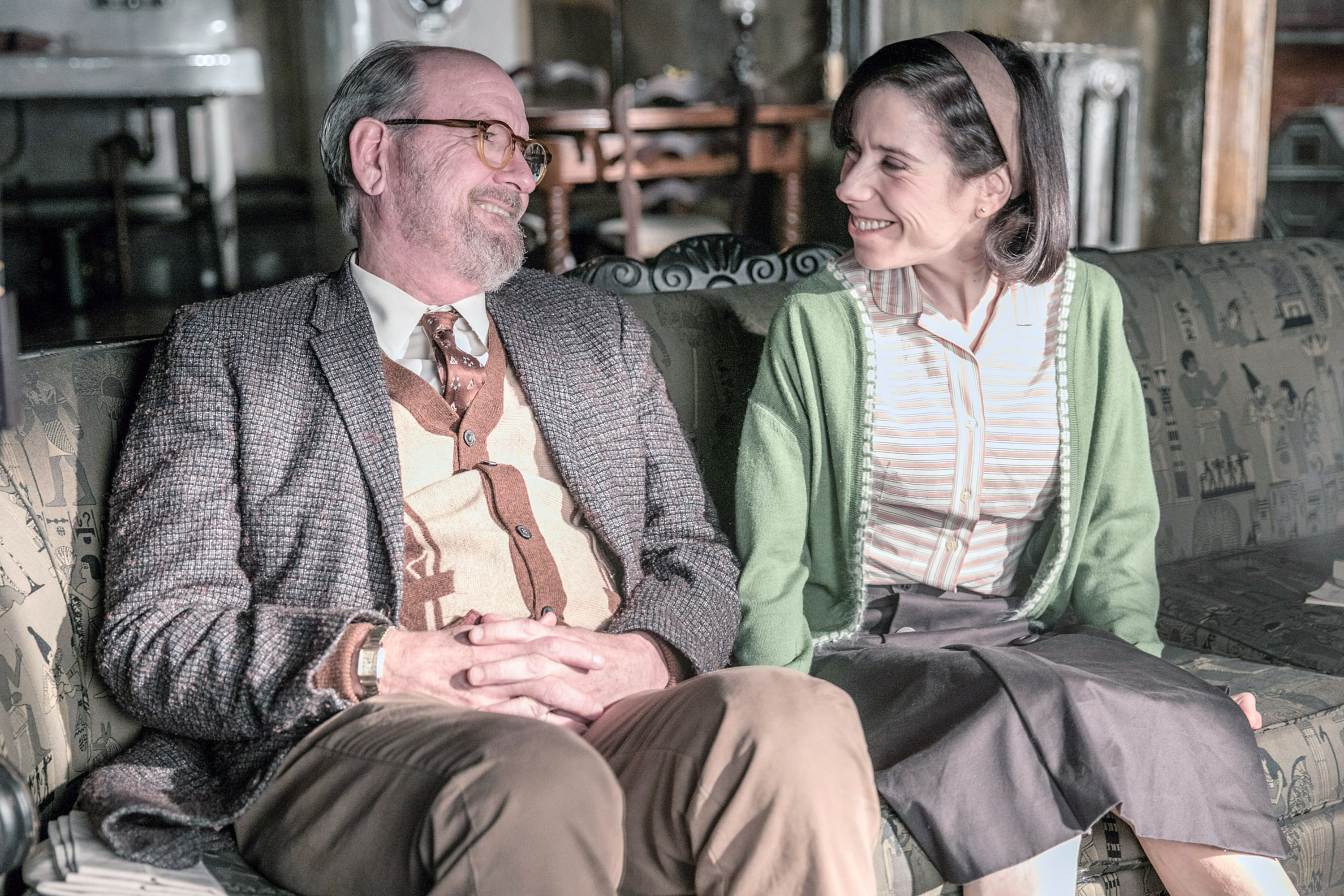 Richard Jenkins and Sally Hawkins sit on a couch 