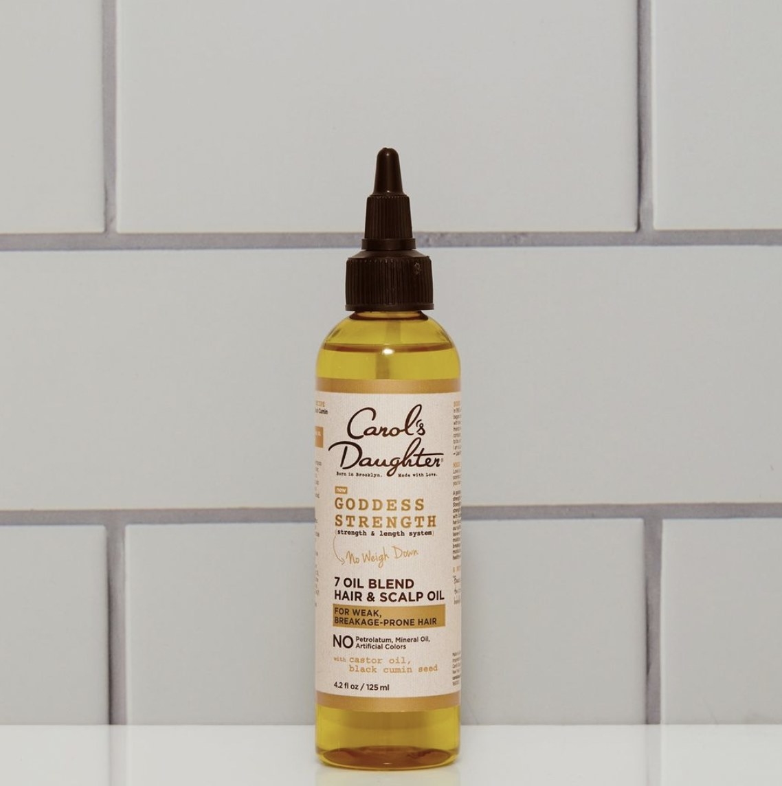 A bottle of hair and scalp oil