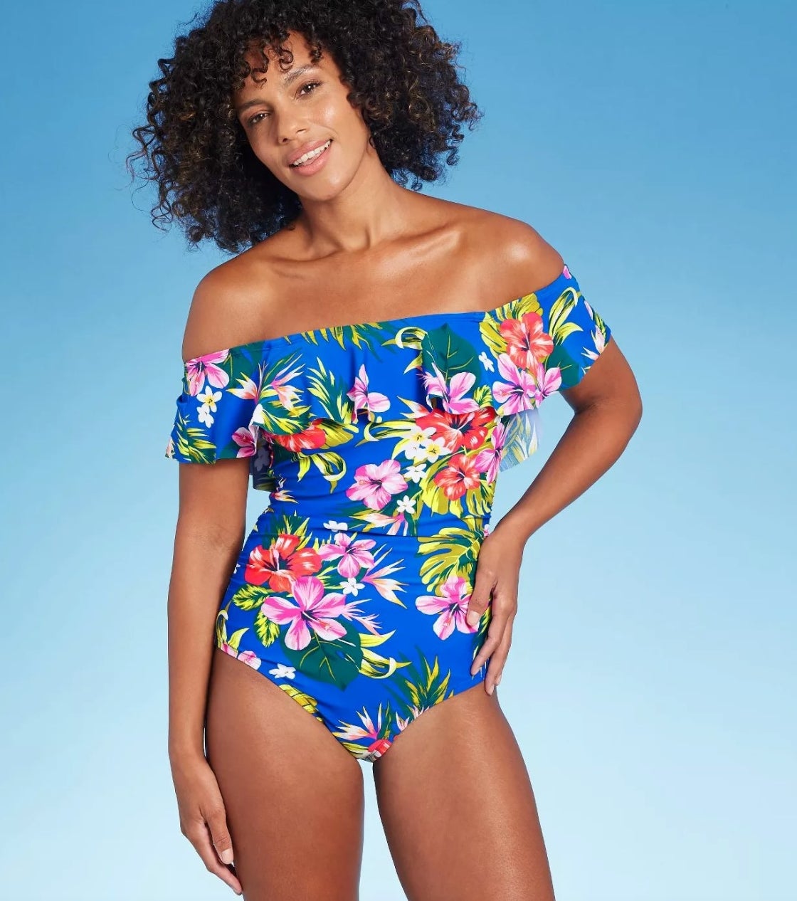 model wearing the blue floral bathing suit