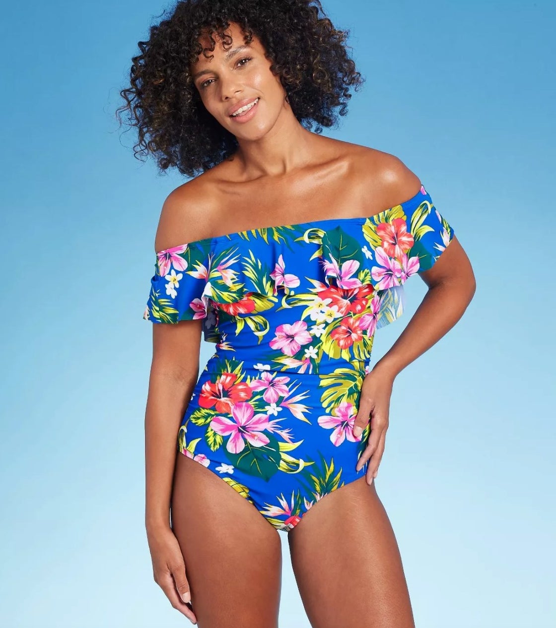 model wearing the blue floral bathing suit