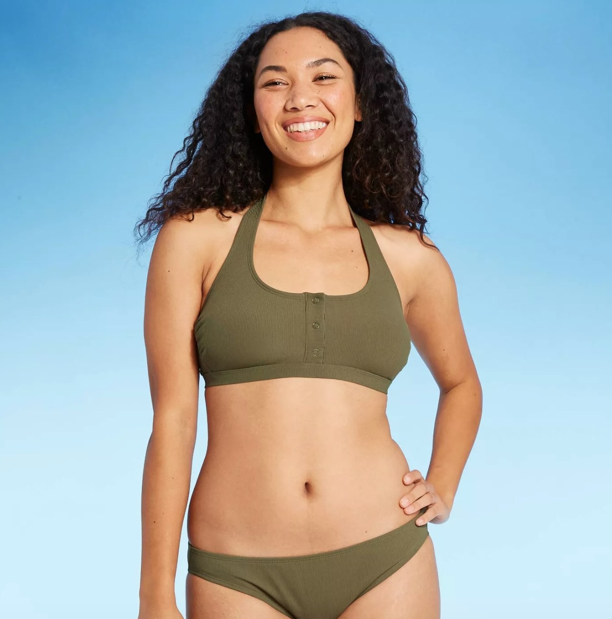 model wearing the green bikini top 
