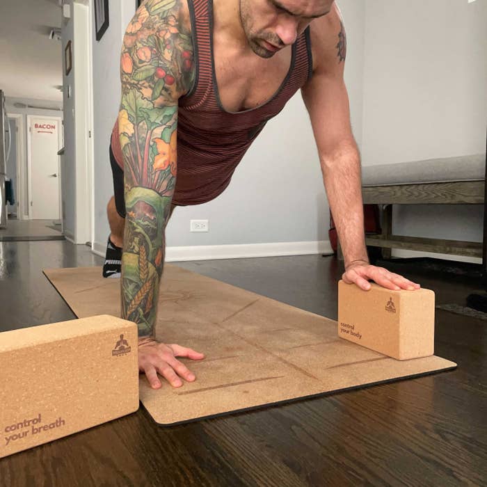 Reviewer using the luxury performance cork yoga blocks