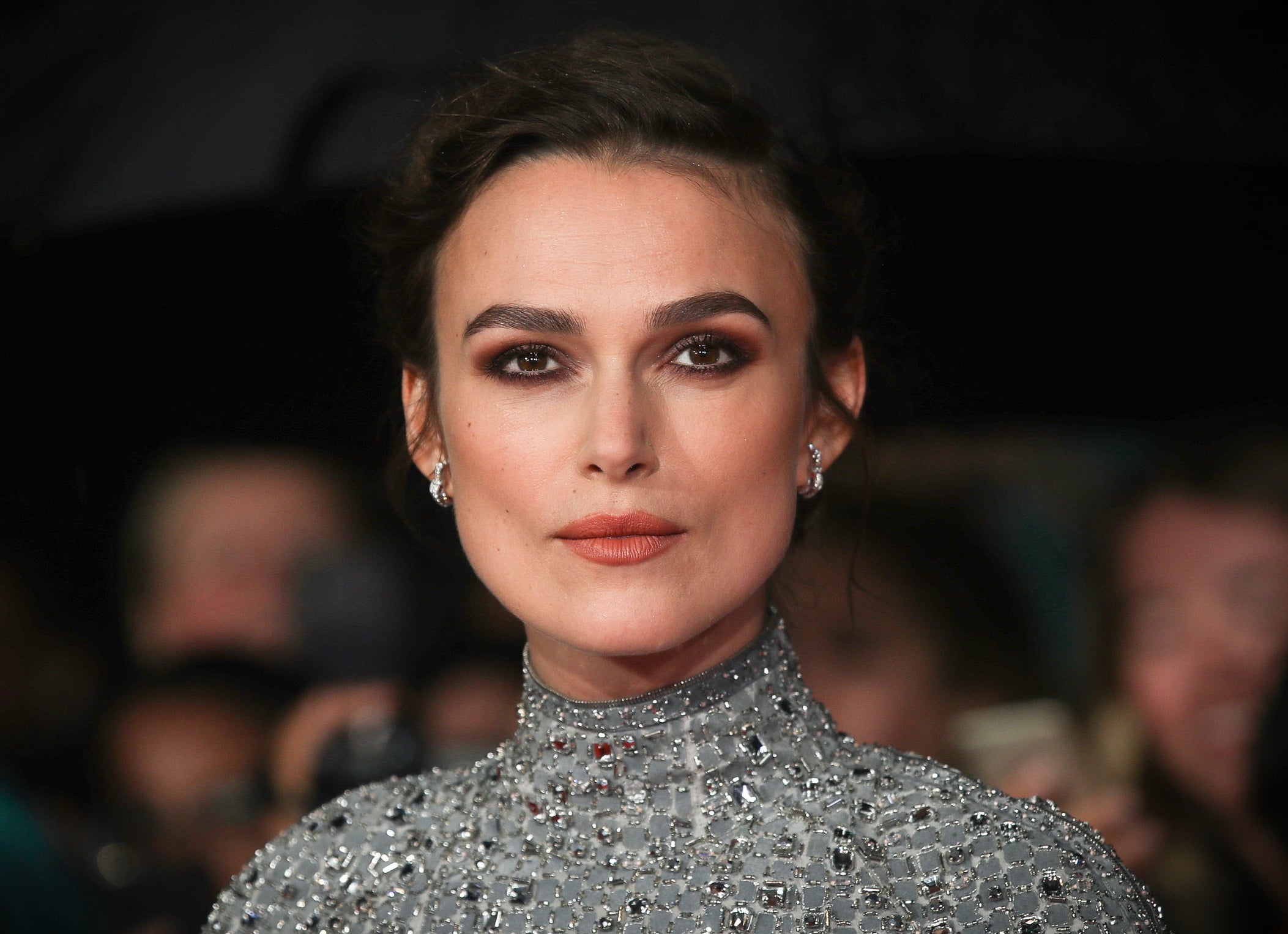 Keira looks serious while attending an event