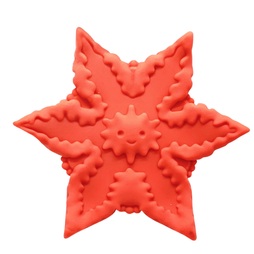 Orange star-shaped silicone vibrator with detailed ridges and a smiley in the middle