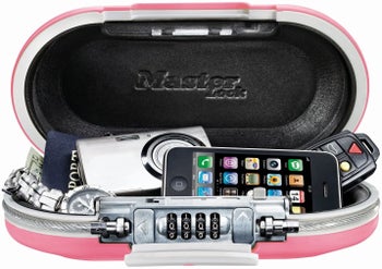 pink masterlock personal safe with belongings inside of it