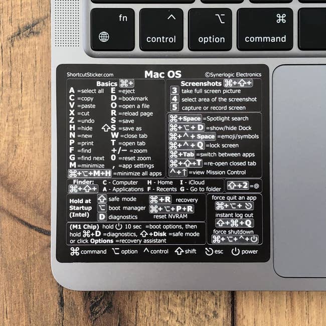 Shortcut sticker placed on bottom of Macbook