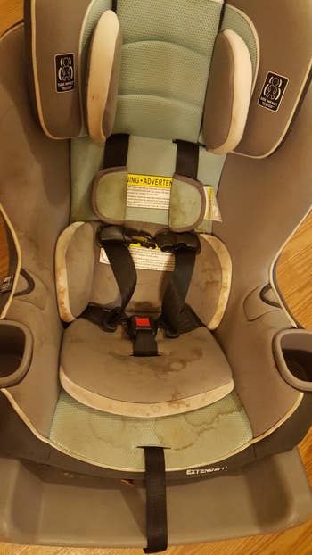 Reviewer's photo showing a stained car seat