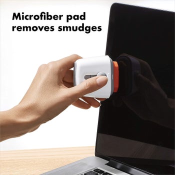 Model using microfiber pad to clean laptop screen