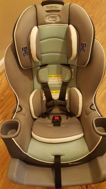 Reviewer's after photo showing a spotless car seat after it was cleaned