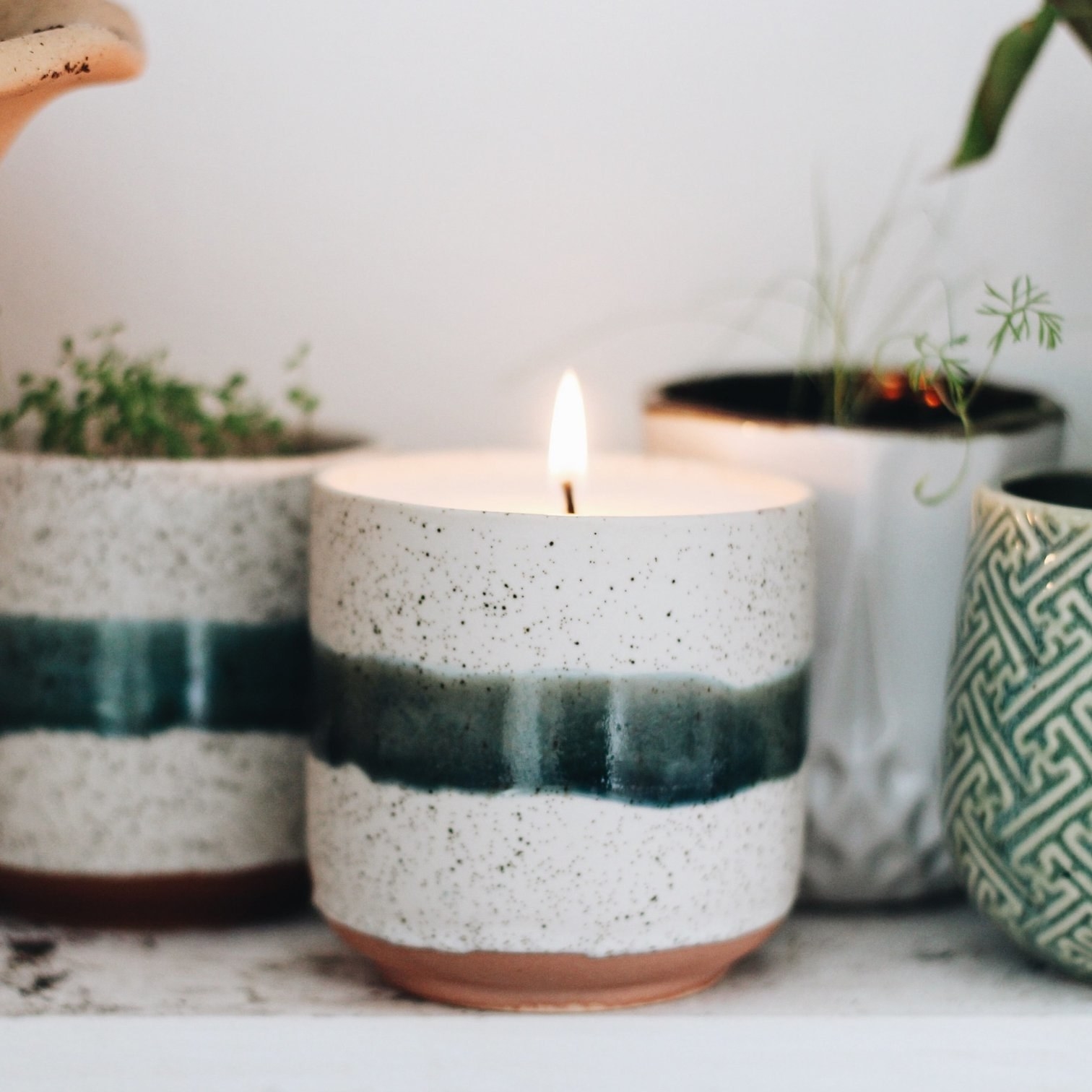 ceramic pot with candle 