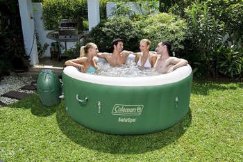 people hang out in inflatable tub 