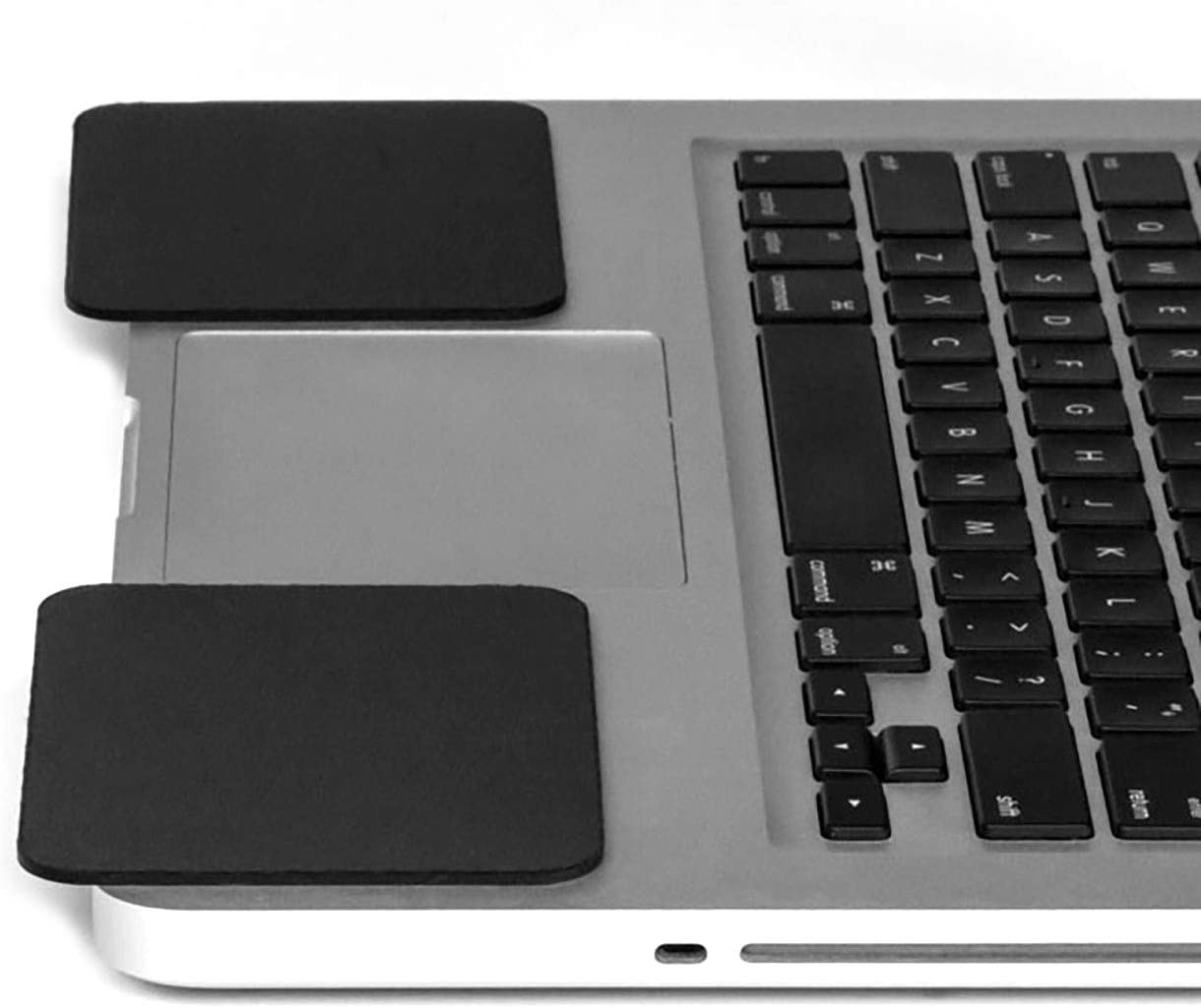 Wrist pads placed on both sides of Macbook touchpad