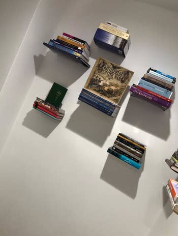 lots of floating bookshelves in a wall