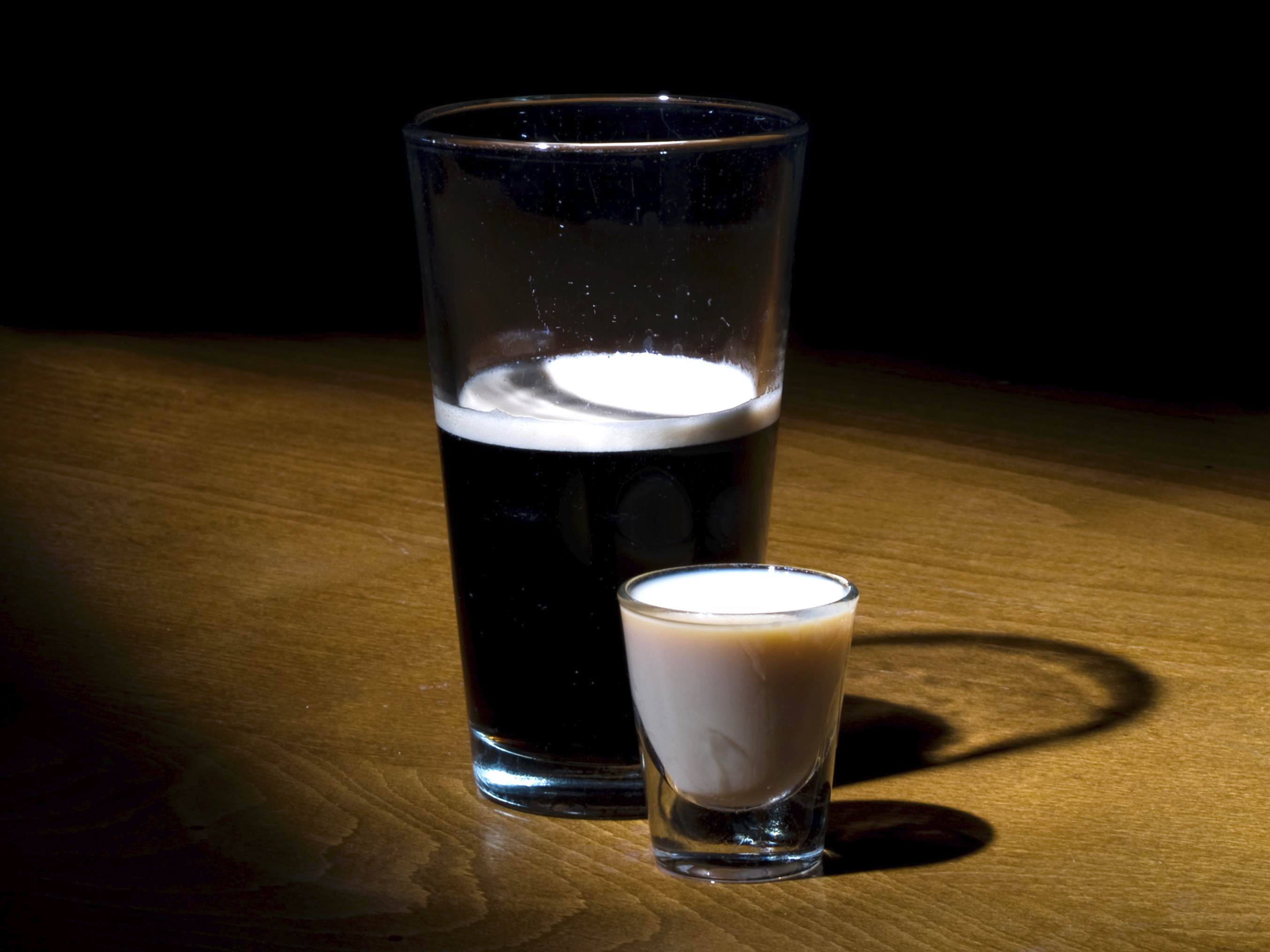 Glass of stout with a shot of Irish cream