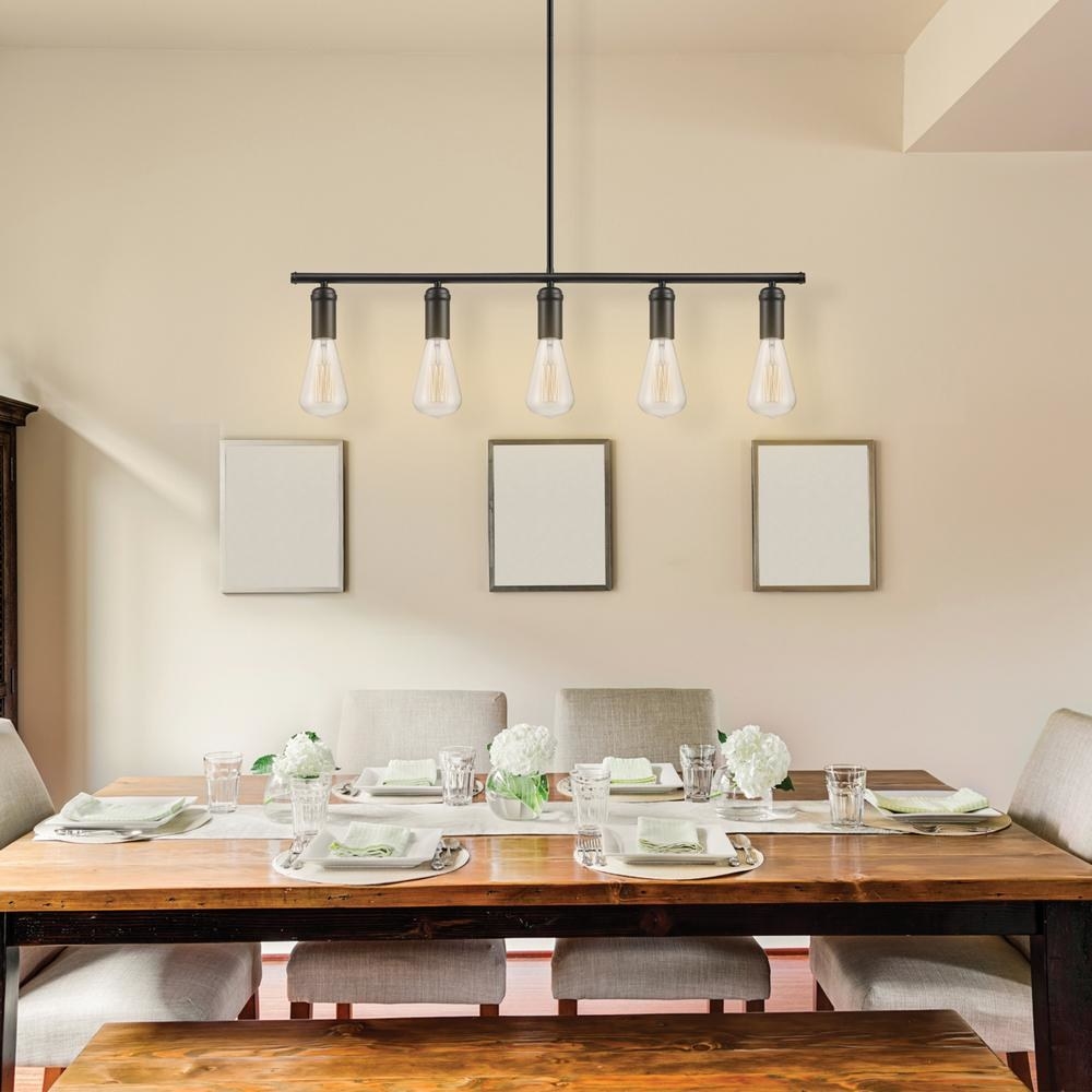 The light hanging above a dining room table