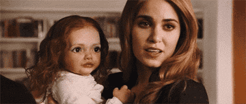 Rosalie holding a young Renesmee