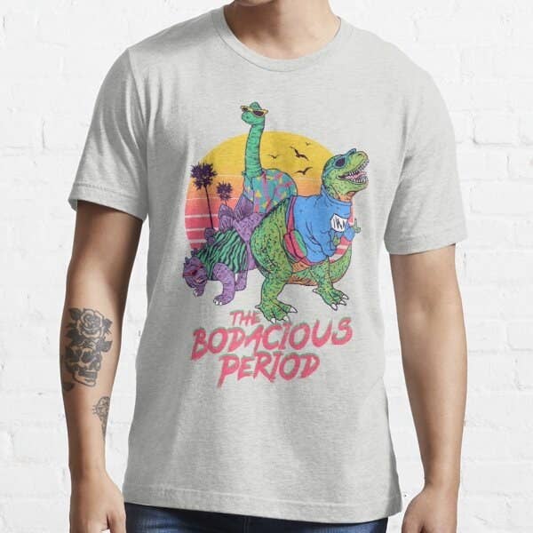 A T-shirt graphic of dinosaurs in \&\#x27;80s like attire with the words \"The Bodacious Period\" written on the front