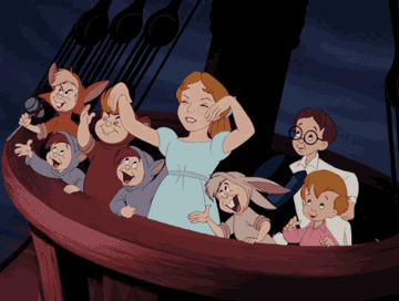 a gif of wendy and the lost boys cheering
